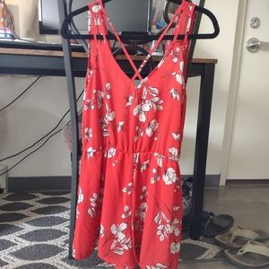 Red floral romper with strappy details